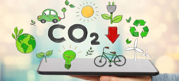 reduce carbon emissions graphic with tablet adobestock 196959895 hero image@2x 1